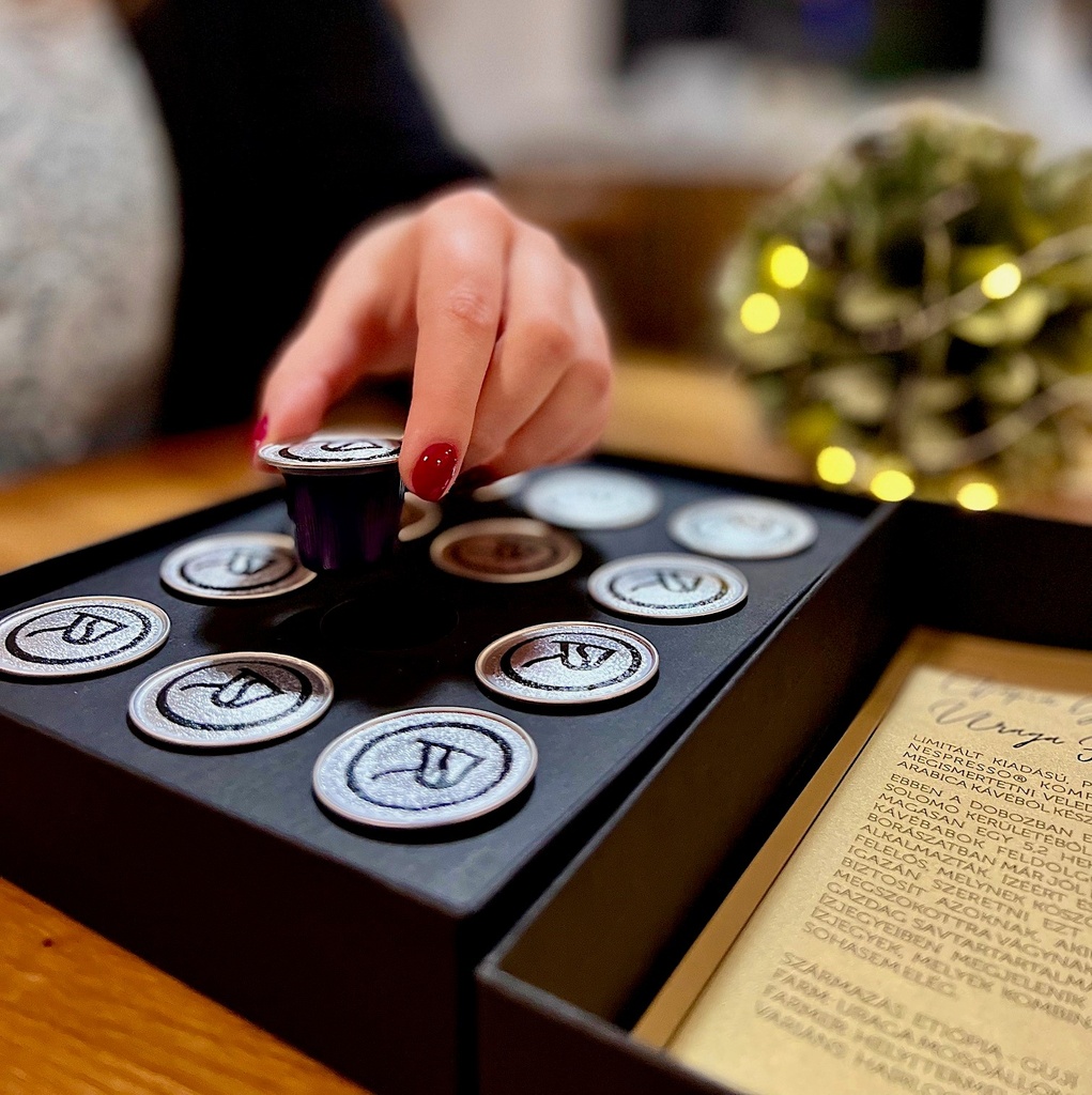 A selection of Nespresso compatible capsules in a gift box